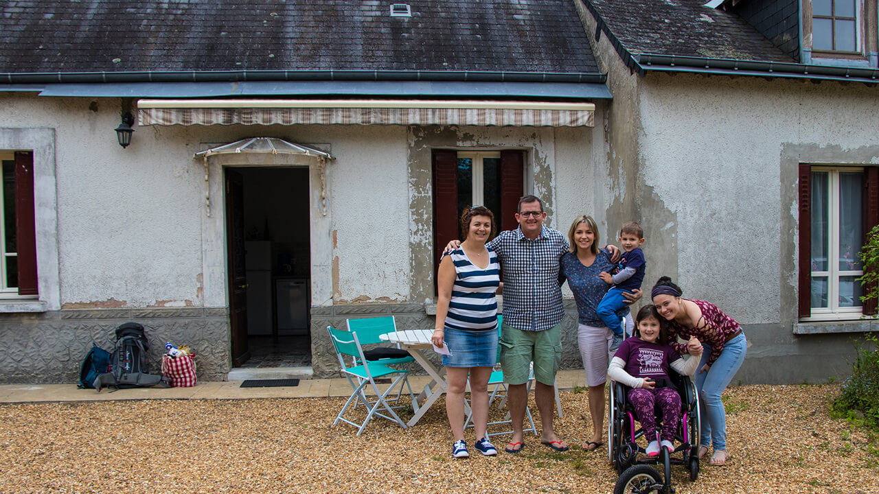 Hélène, our host, with us in front of her grandmother's house